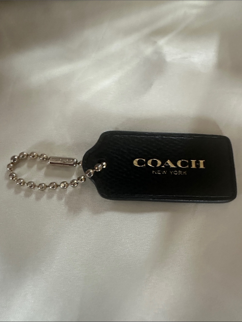 Coach Black Leather Hang Tag with Gold Logo and Coach ball chain